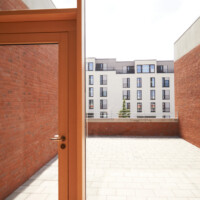 Blick aus der Schule auf die Siedlung